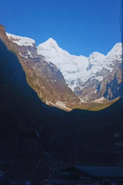 Untitled design (5)Ahermitage in the himalayas neelkhant view